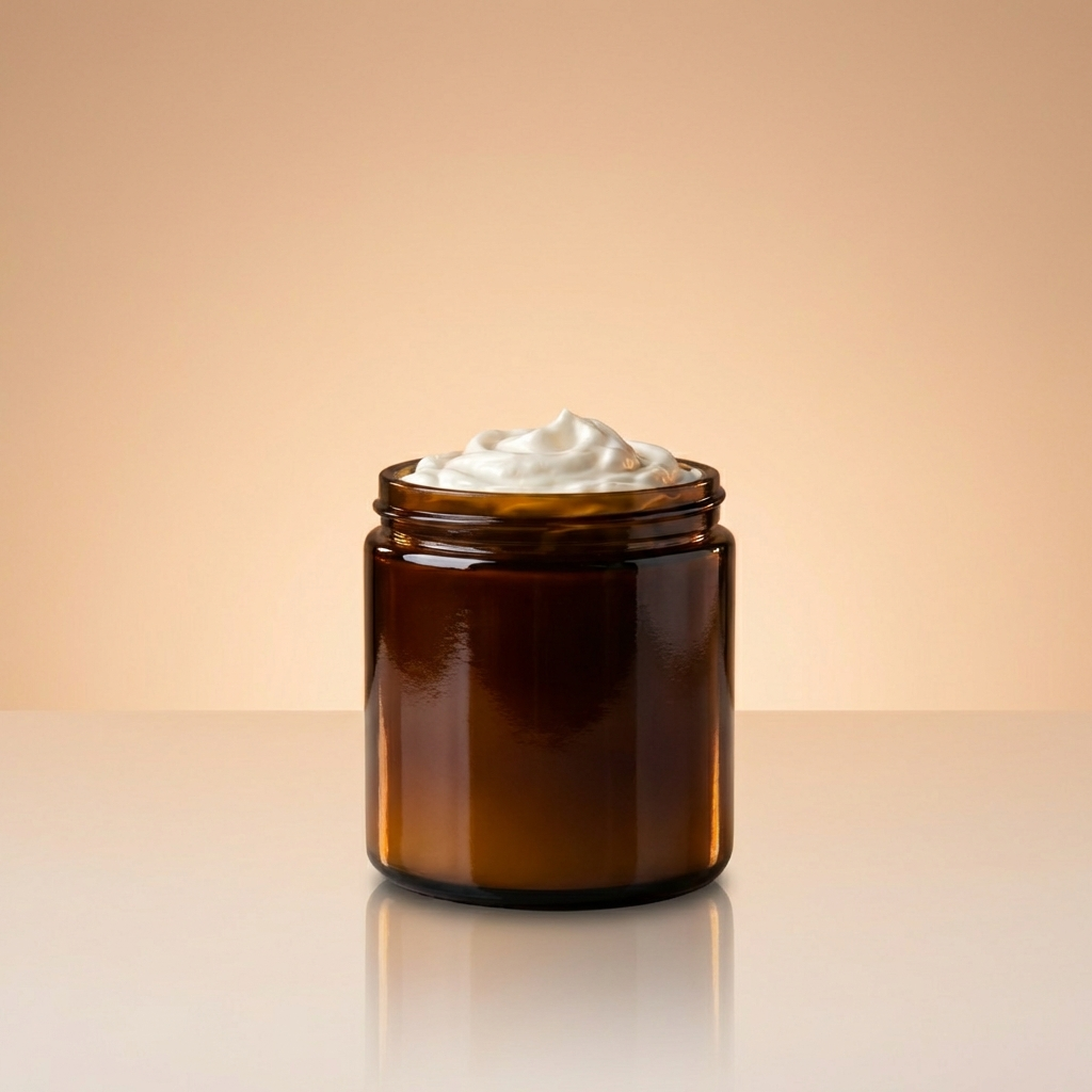 Amber glass jar with white cream on a gradient background